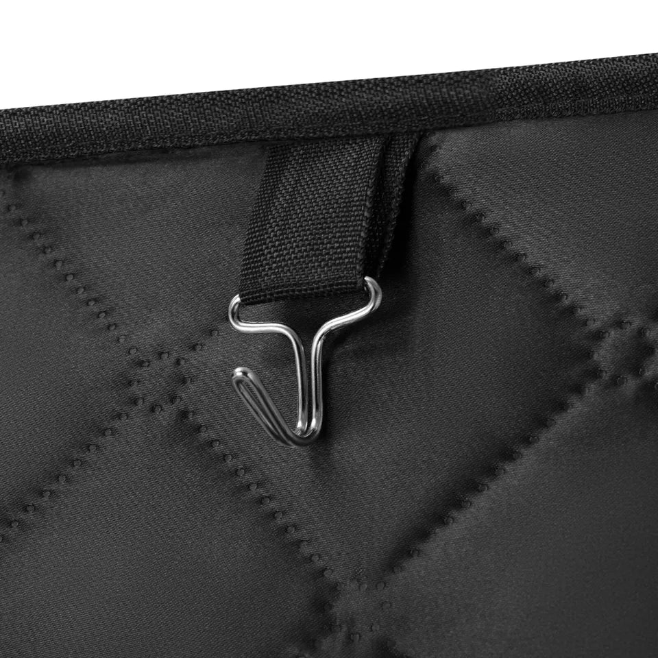 "Close-up of a hanging hook attached to the quilted interior wall of a sauna tent, designed for holding small items like towels or clothing. Shows the functional detail and sturdy stitching of the tent's interior.
