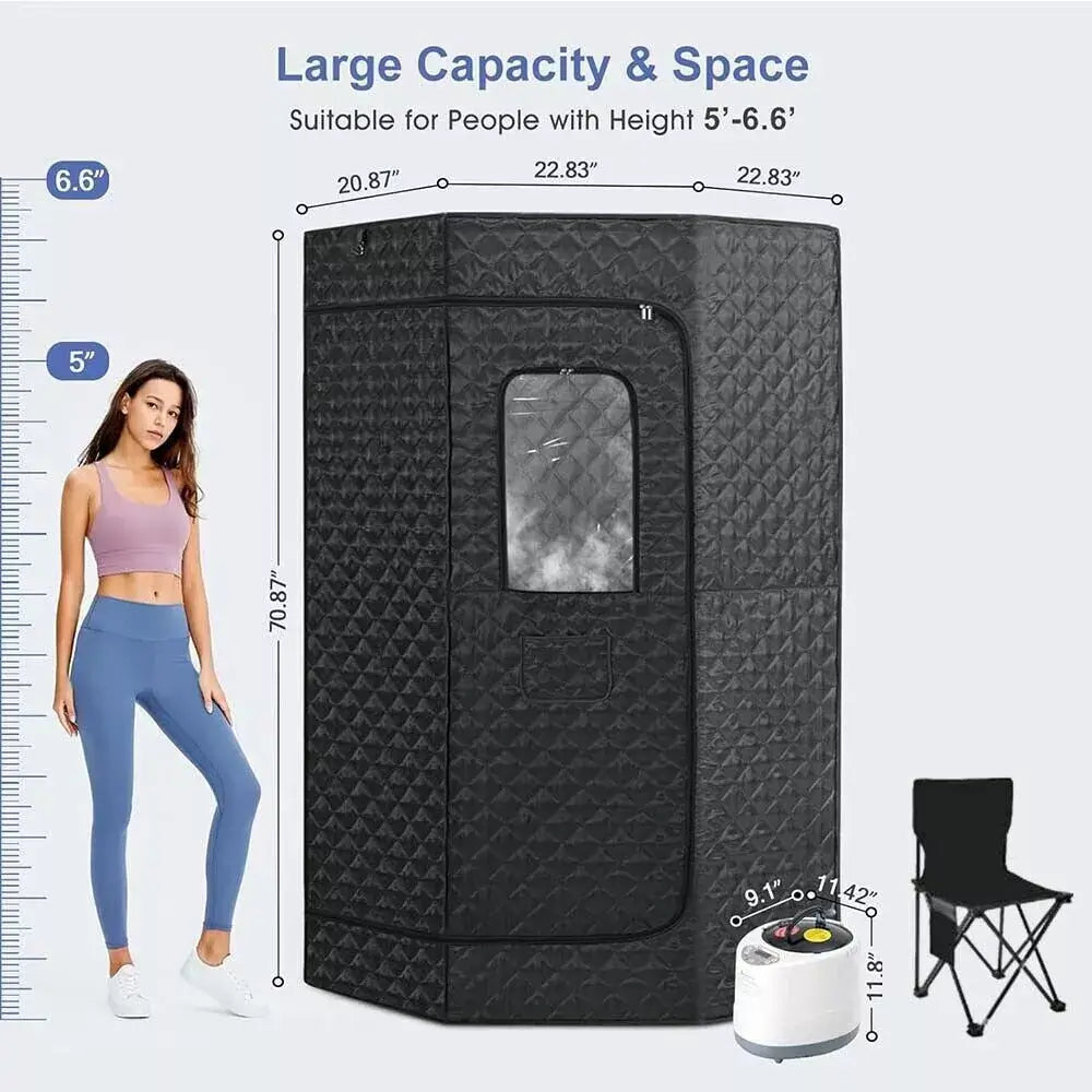 "Large black sauna tent with a windowed front panel, shown beside a woman for scale and a foldable chair and steam generator. Text highlights its spacious interior and suitability for users up to 6’3” tall.