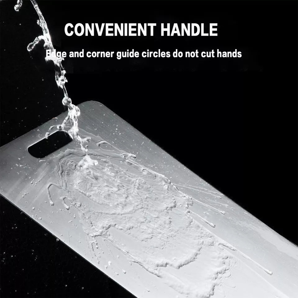 "Close-up of a Titanium Cutting Board under running water, featuring a built-in handle and engraved surface pattern. Text overlay highlights the convenient handle for grip and easy storage.