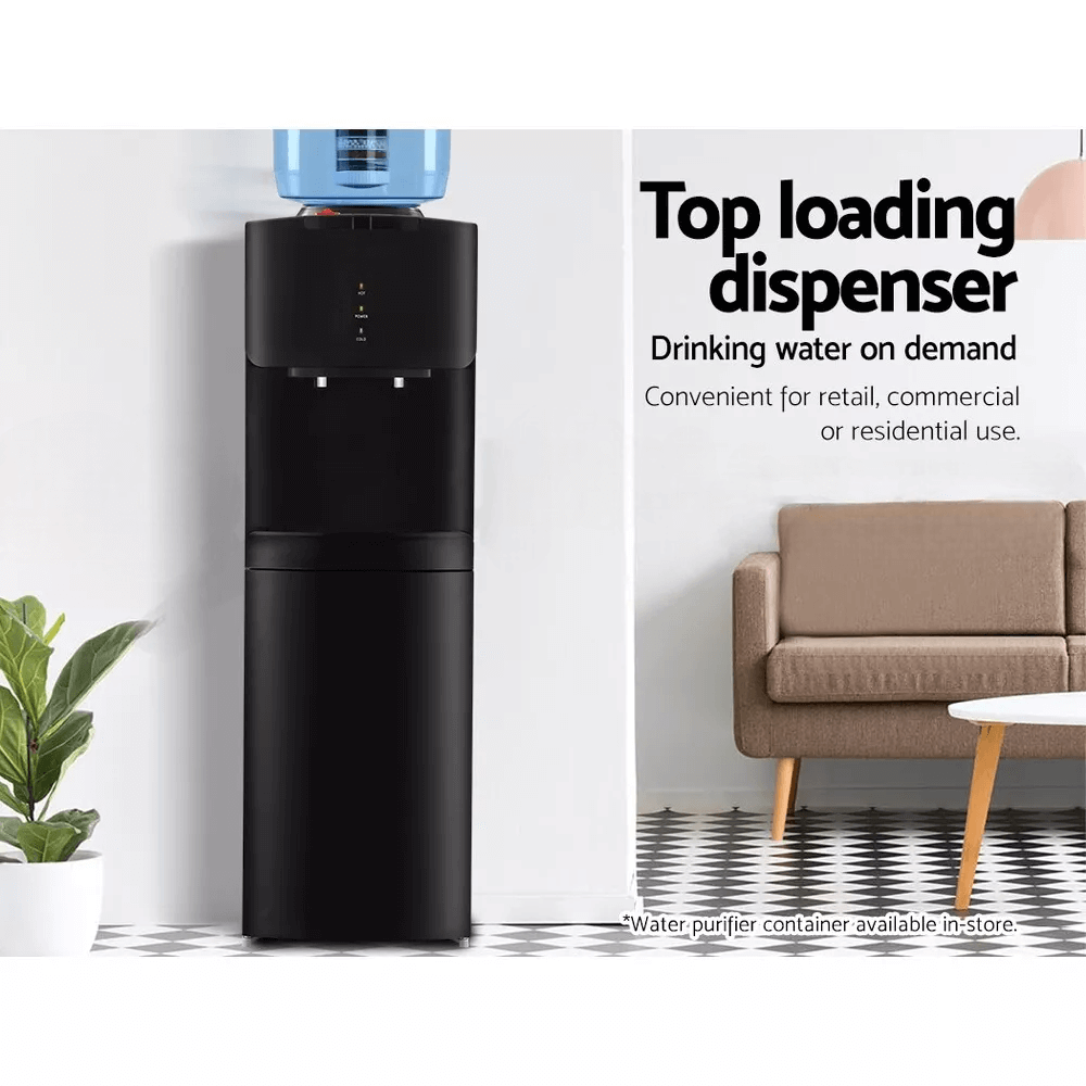 Black top-loading water dispenser placed in a modern living space, designed for convenient hot and cold water dispensing.