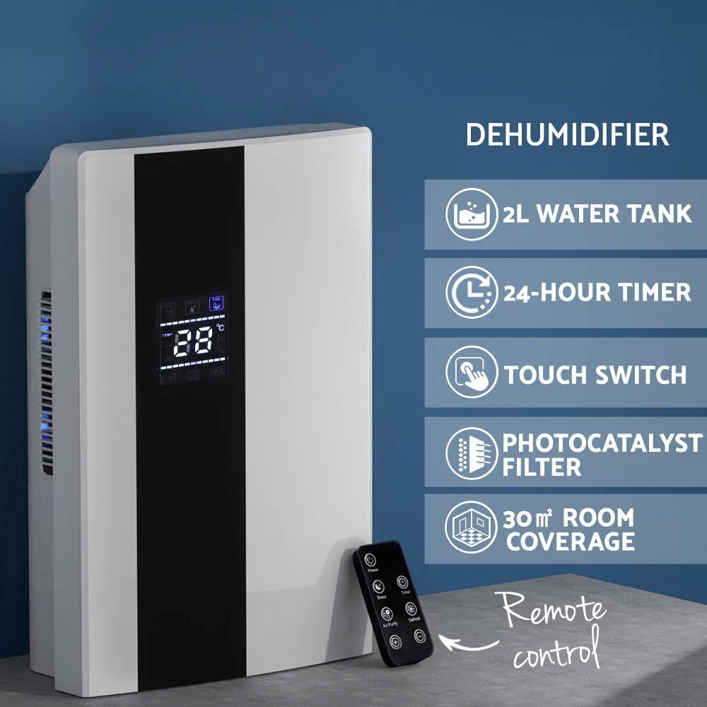 Modern dehumidifier with a sleek black and white design, featuring multiple functions and a remote control for easy operation.