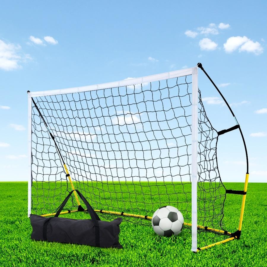 Outdoor portable soccer goal on green field with net and strong metal frame for training