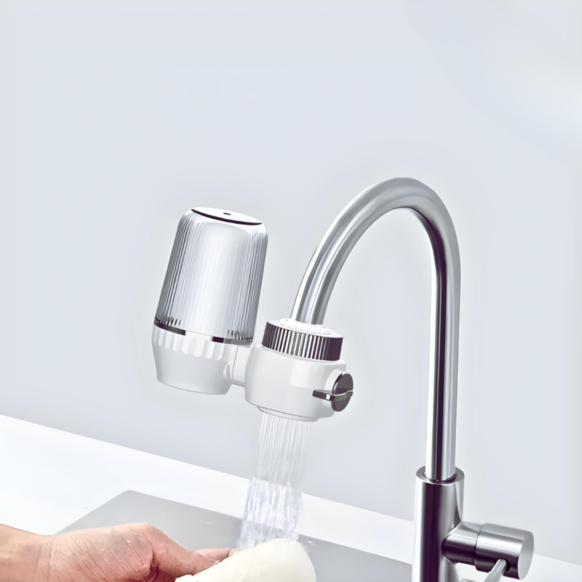 Water purifier filter attached to kitchen tap for clean drinking water and improved taste