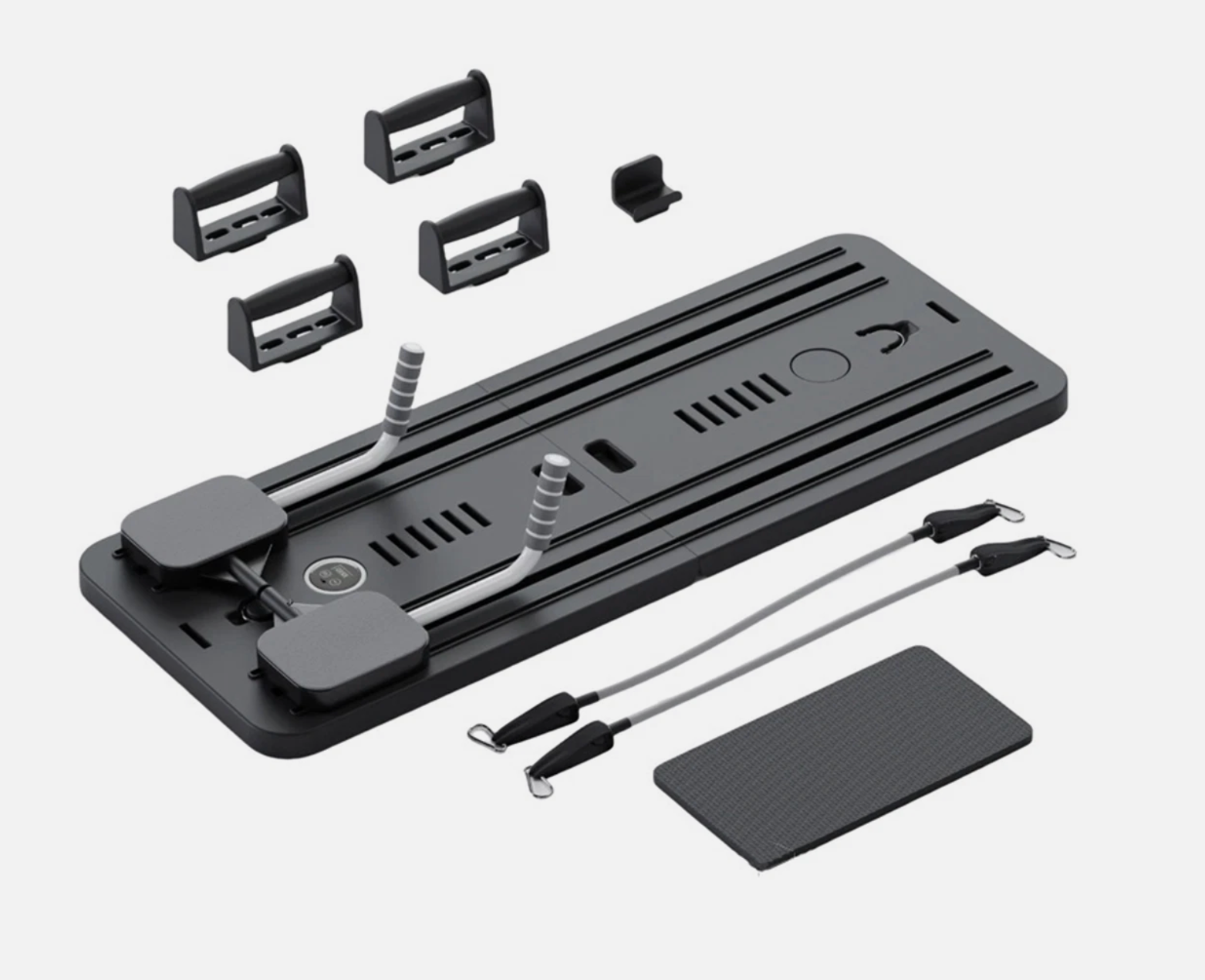 Black reformer Pilates machine complete set with resistance bands and accessories for strength and flexibility training.