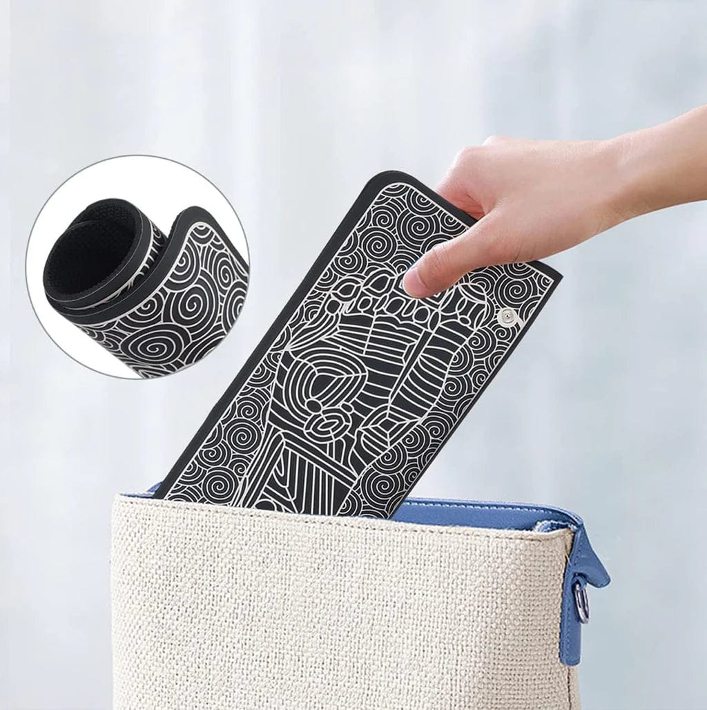 Compact and foldable EMS foot massager being stored in a bag, designed for easy portability and space-saving convenience