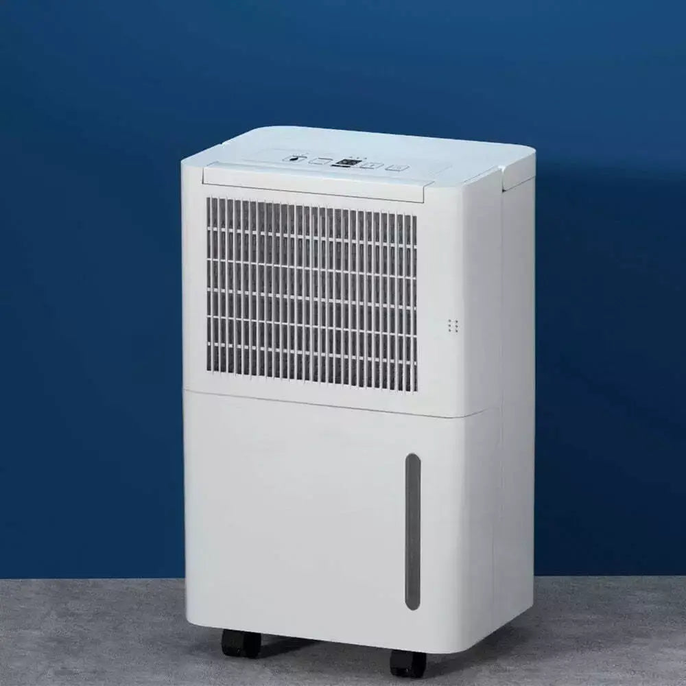 White portable dehumidifier with a modern design, designed for reducing humidity and improving air quality in indoor spaces