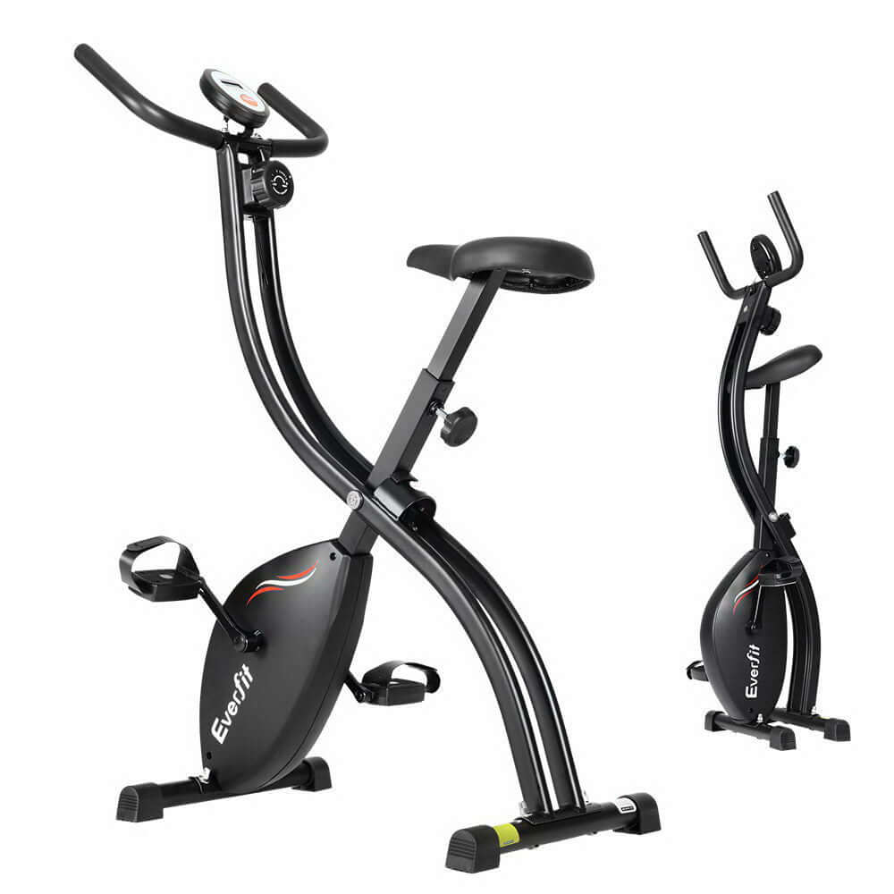 Black foldable exercise bike displayed in both open and folded positions, designed for compact storage and efficient home cardio workouts