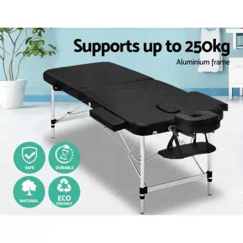 Black massage table with adjustable headrest, durable metal legs, and high weight capacity, designed for stability and professional use, supporting up to 250kg.