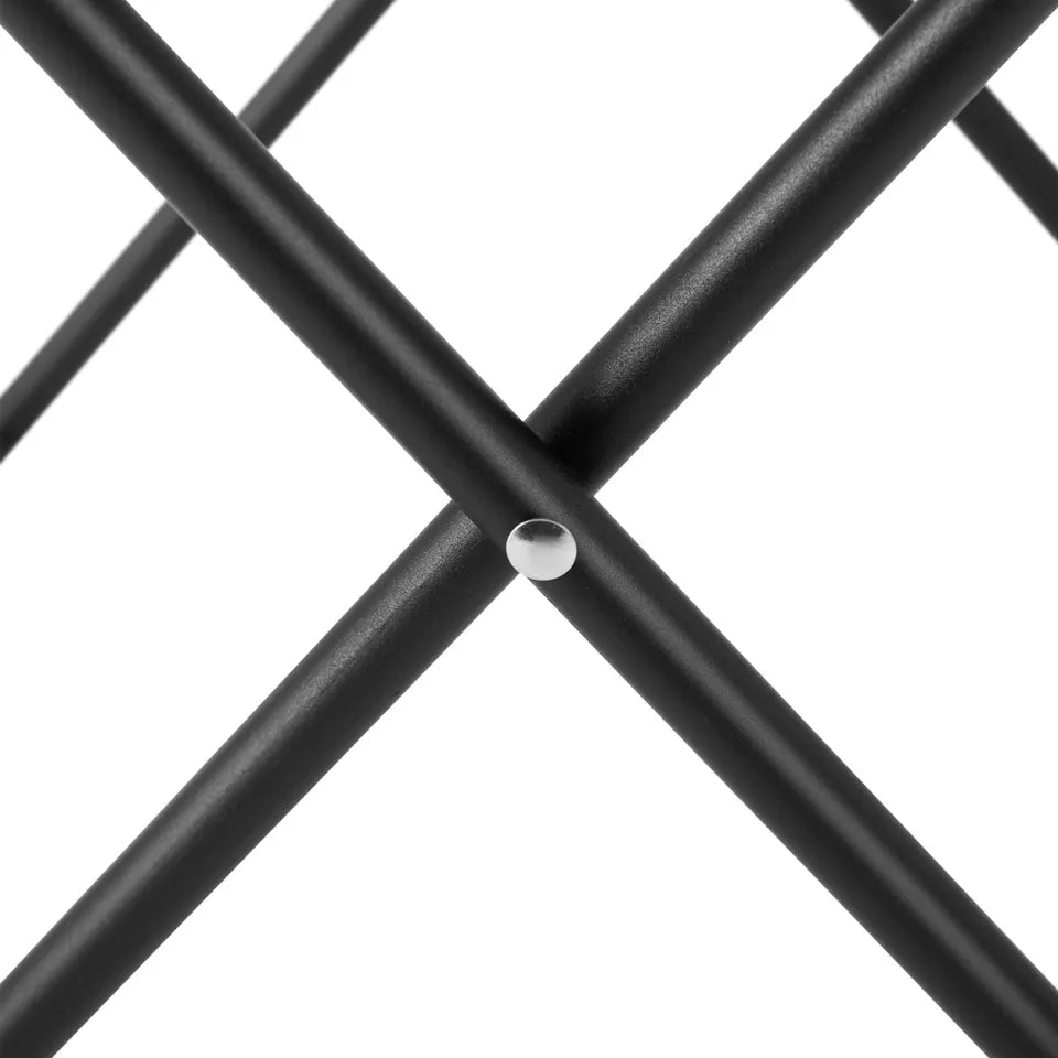 Close-up of crossed black support poles used for assembling a sauna tent, highlighting the durable metal construction and interlocking joint design for easy setup and stability.