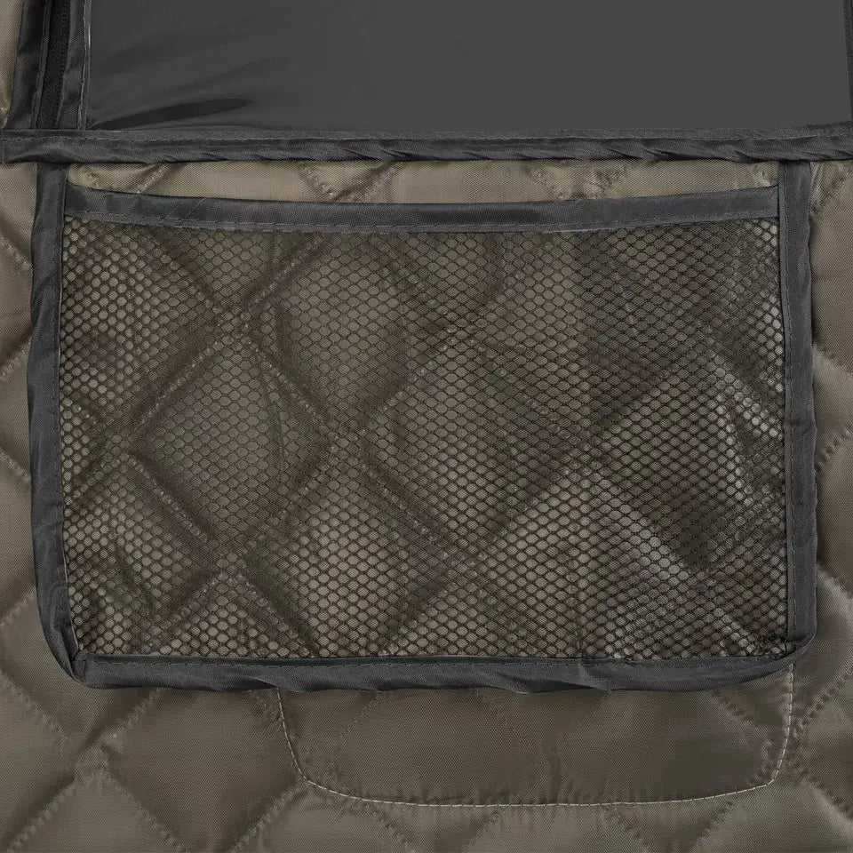 Close-up of a quilted pocket on the exterior wall of a sauna tent, showcasing the insulated, textured fabric and stitching detail. The pocket is designed for convenient storage of small items during sauna sessions.