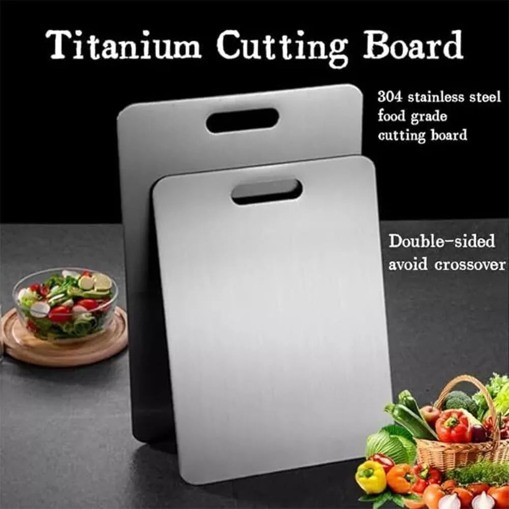 Two sleek Titanium Cutting Boards standing upright on a black countertop, with fresh vegetables placed nearby. Text overlay highlights the boards as rust-resistant, durable, and hygienic kitchen essentials.