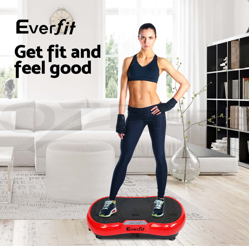 Woman exercising on a red vibration machine in a home setting, using resistance bands for a full-body workout to improve fitness and muscle tone