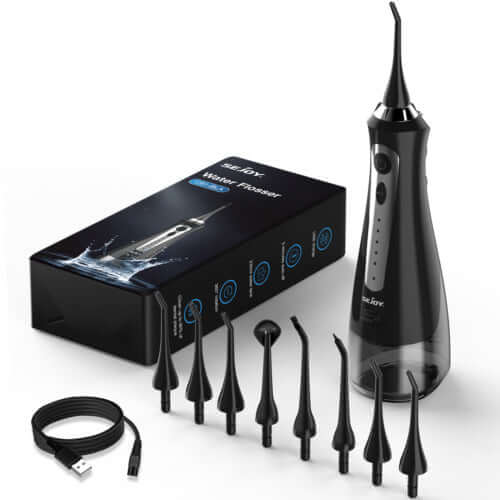 Black water flosser with 8 jet tips, USB cable, and storage case – perfect for deep oral cleaning at home or on the go